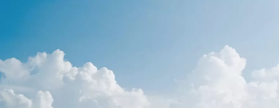 fluffy clouds and blue sky