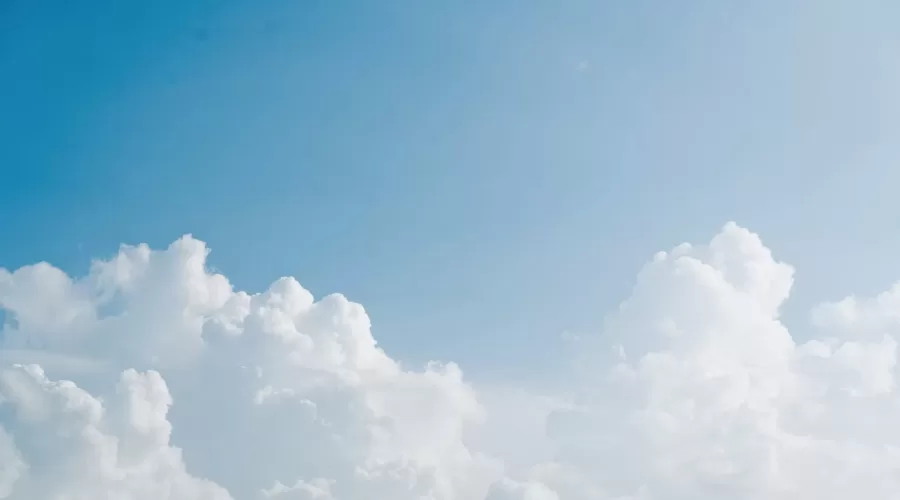 fluffy clouds and blue sky